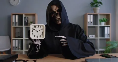 Grim Reaper With Clock In Office Setting Stock Footage 316783906