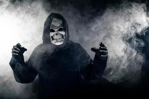 Grim Reaper Ghost Coming out of the Foggy Mist 스톡 사진