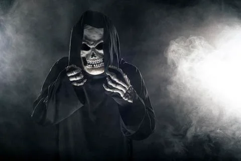 Grim Reaper Ghost Coming out of the Foggy Mist 写真素材