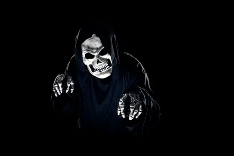 Grim Reaper Ghost Coming Out of the Dark Shadows Foto stock