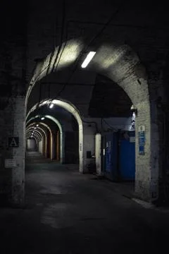 Grimy and run down brick tunnel Stock Photos