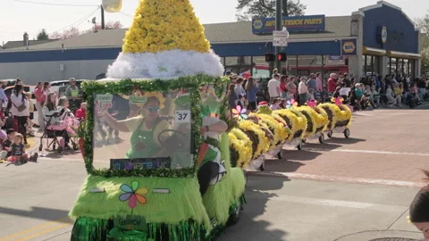 Grinch themed festive parade golf cart train decorated with yellow sammer egg 43 Stock Footage 339987178