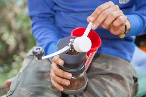 Grind coffee by hand Stock Photos