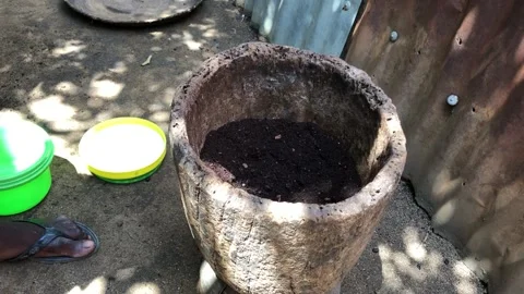 Grind coffee in a mortar Stock Footage 220560690