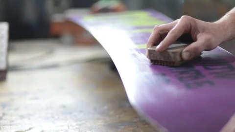 Grind edge on a snowboard in the service Stock Footage 105651628