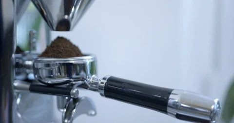 Grind fresh coffee beans for a espresso Stock Footage 84783580