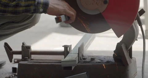 Grind the workpiece to improve the surface.After cutting the workpiece. Stock Footage 289557567