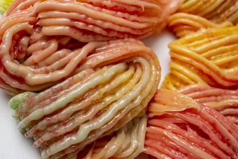 Grinded turkish delight paste, colorful gradient soft sugar paste, close up Stock Photos