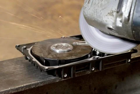 Grinder and hard disk drive Stock Photos