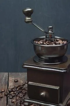 Grinder , coffee beans. Selection of fresh coffee for espresso.  wooden bac.. Stock Photos
