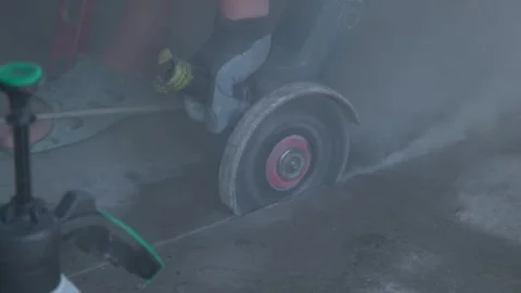 A grinder cuts concrete close-up Stock Footage 323367875