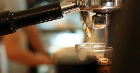 Grinder dispenser machine working pouring coffee in cafe restaurant Stock Footage 81257248