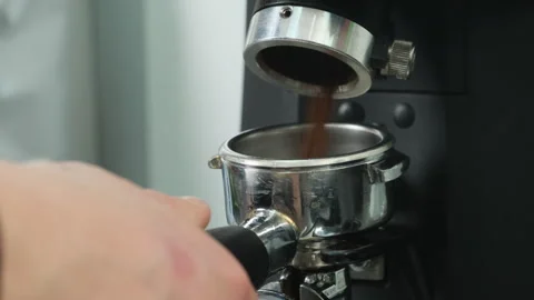 Grinder finely grinds coffee beans to reveal future flavour of beverage Stock Footage 306609069