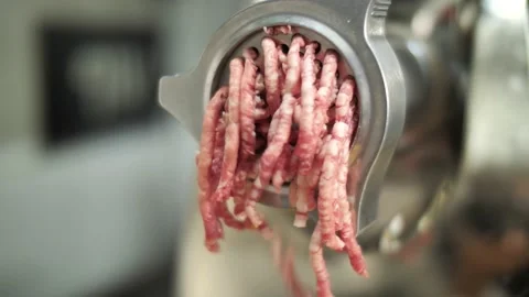 Grinder machine producing minced meat, close up Stockbeeldmateriaal 220273055