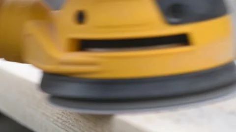 Grinder machine for wood, Eccentric orbital sander on wooden surface, close up Stock Footage 162632689