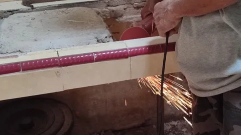 Grinder Sparks Shower During Concrete Demolition Work Vídeos de archivo 335341822
