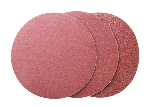 Grinding abrasive wheels on a white background. Top view Stock Photos