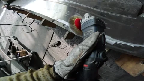 Grinding and processing of an aluminum part, first-person view. Worker operates Видео 336095130