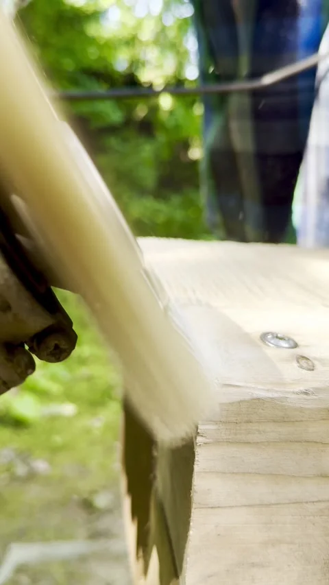 Grinding and Smoothing Wooden Structure With Angle Grinder Stock Footage 342166909