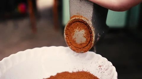 Grinding of aromatic coffee beans with a manual coffee grinder. Vintage grinder Stock Footage 271630878
