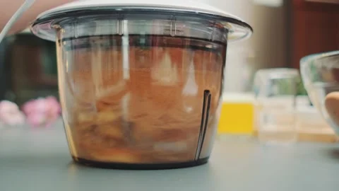 Grinding biscuit cookies with a blender Stock Footage 249246043