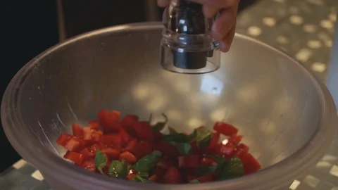 Grinding Black Pepper on Salad Video stock 99246359
