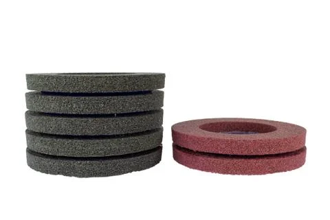 Grinding circles of varying rigidity to handle metal. Stock Photos