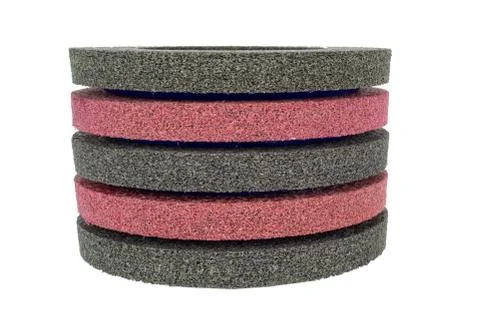 Grinding circles of varying rigidity to handle metal. Stock Photos
