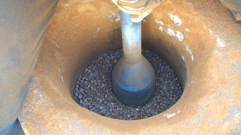 Grinding Cocoa Manually Stock Footage 105398425