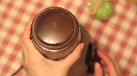 Grinding coffee beans in a grinder Stock Footage 59886869