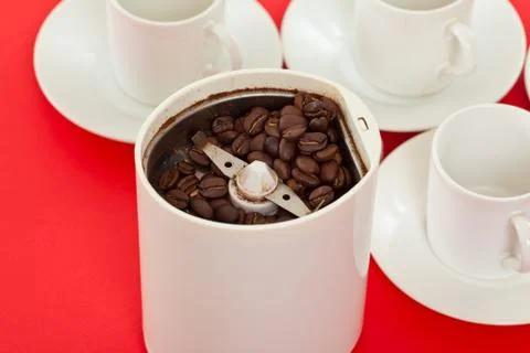 Grinding coffee beans to make coffee Stock Photos