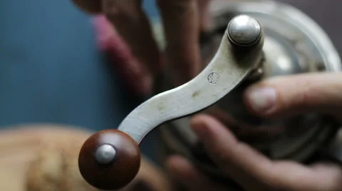 Grinding coffee beans in the old coffee grinder. Macro Stock Footage 68905547