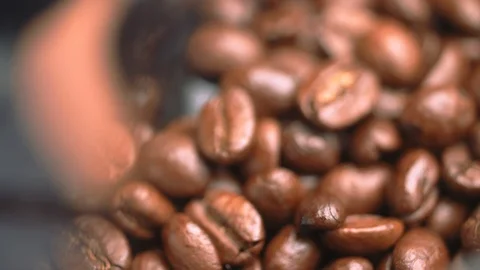 Grinding Coffee beans shot through a prism Stock Footage 91505577