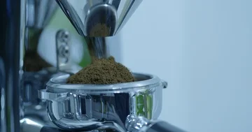 Grinding Coffee Beans Using The Coffee Machine Stock Footage 85715928