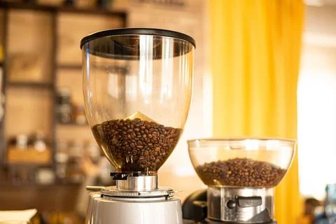 Grinding coffee in coffee machine Stock Photos