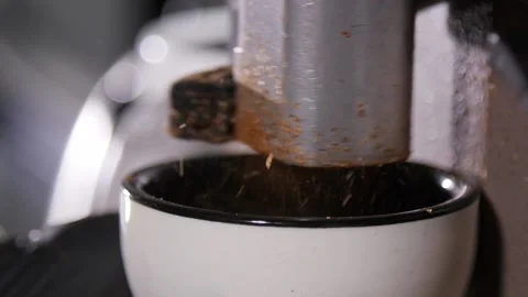 Grinding coffee for cupping - close up Stockbeeldmateriaal 152657047