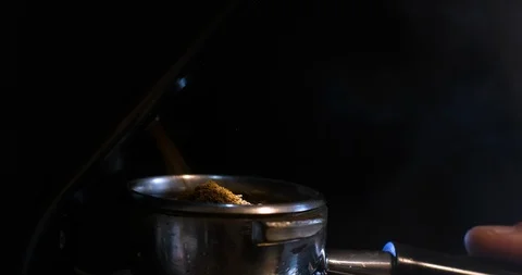 Grinding coffee into filter holder process Stock Footage 122371314