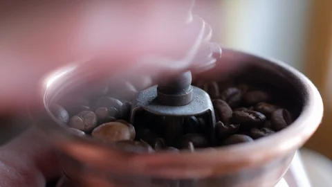 Grinding coffee in a hand mill Stock-Footage 88125574