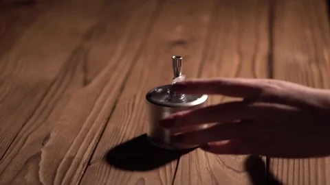 Grinding cones of marijuana with a grinder close-up. Weed buds and grinder in 스톡 동영상 83050223