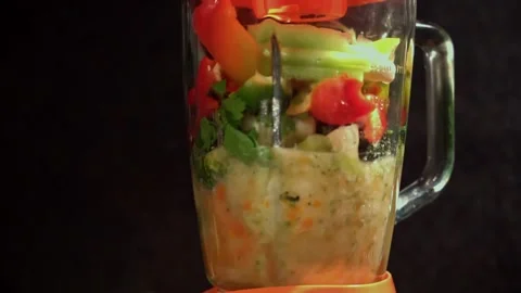 Grinding cooked vegetables in a blender. Cooking soup puree. Stock Footage 170187416