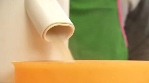 Grinding Grain Using A Home Mill Stock Footage 65212780