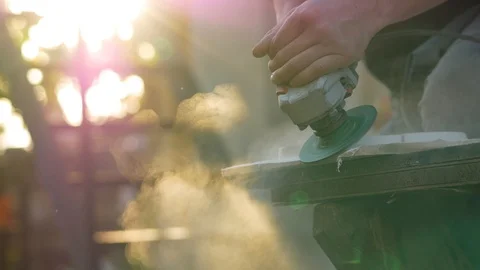 Grinding a gypsum artwork sunset with angle grinder Stock-Footage 117195124