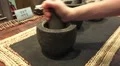 Grinding Herbs To Powder With Mortar and Pestle 4k or 4k+ Resolution