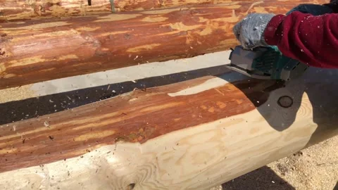 Grinding logs from bark,preparation for construction. Stock-Footage 155209176