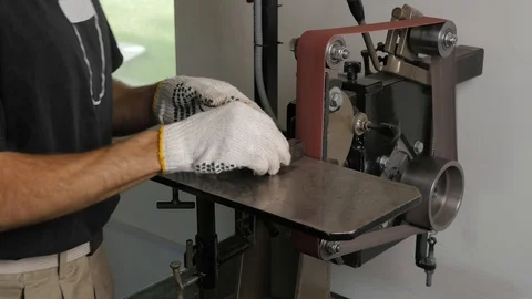 Grinding machine. Grinder. Work on the grinder. Sparks when grinding a metal. Stock Footage 109056323