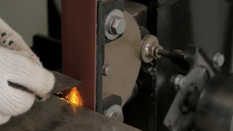 Grinding machine. Grinder. Work on the grinder. Sparks when grinding a metal. Stock Footage 109056348