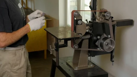 Grinding machine. Grinder. Work on the grinder. Sparks when grinding a metal. Stock Footage 109056462