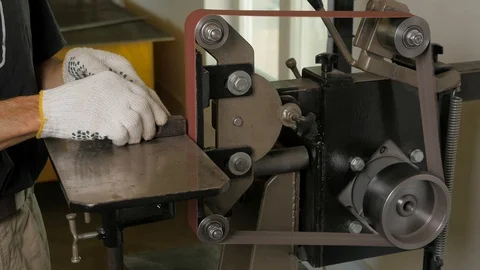 Grinding machine. Grinder. Work on the grinder. Sparks when grinding a metal. Stock Footage 109056470