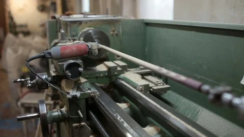 The grinding machine grinds the billiard cue blank Stock Footage 76444573