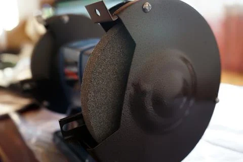 Grinding machine. Sharpening machine for edge tools. Stock Photos